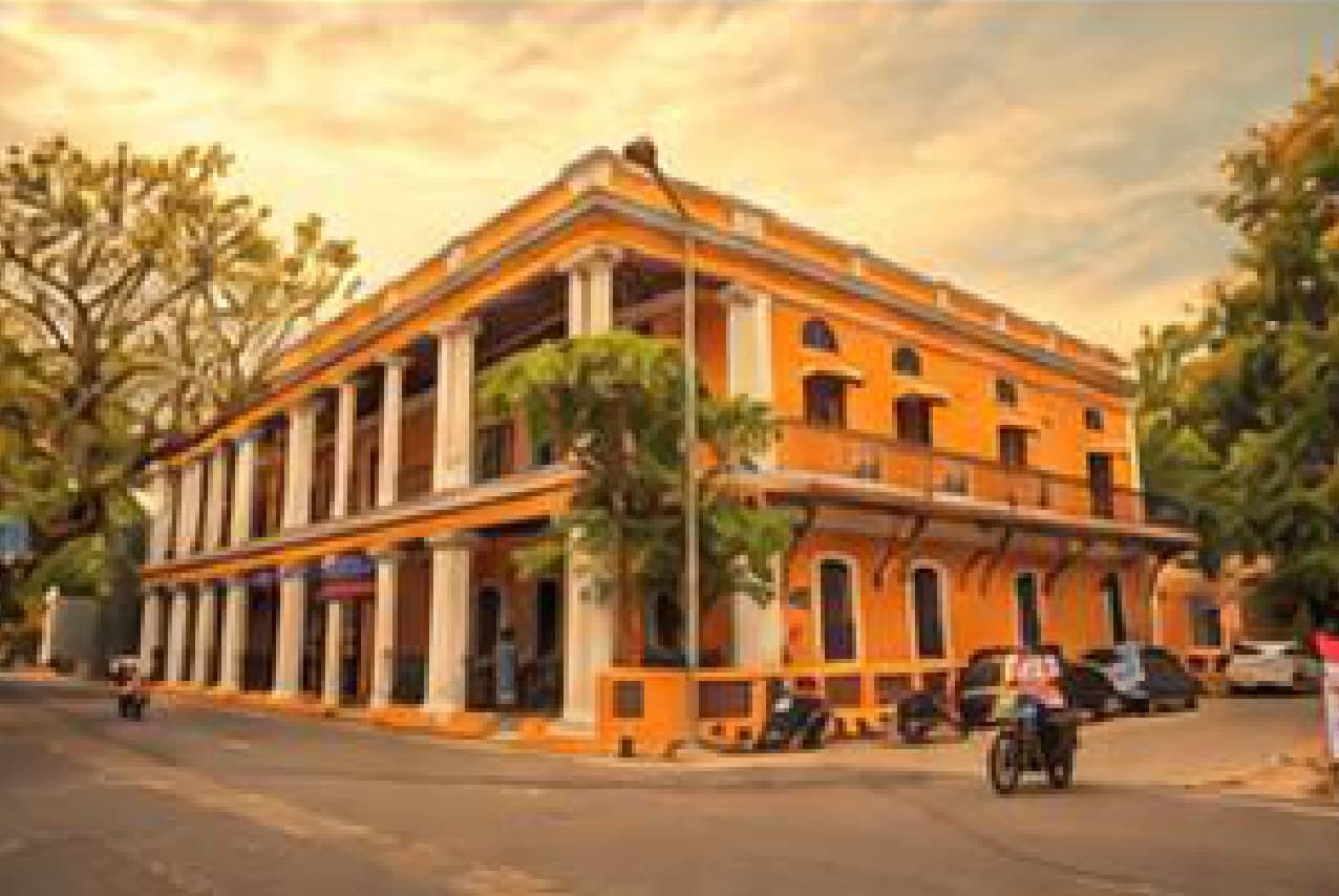 A heritage building corner in Pondicherry's French Quarter, a stop on the French Heritage Walk.